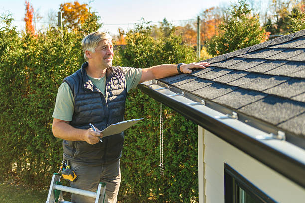 Professional Roofing technician working in Queensbury, NY